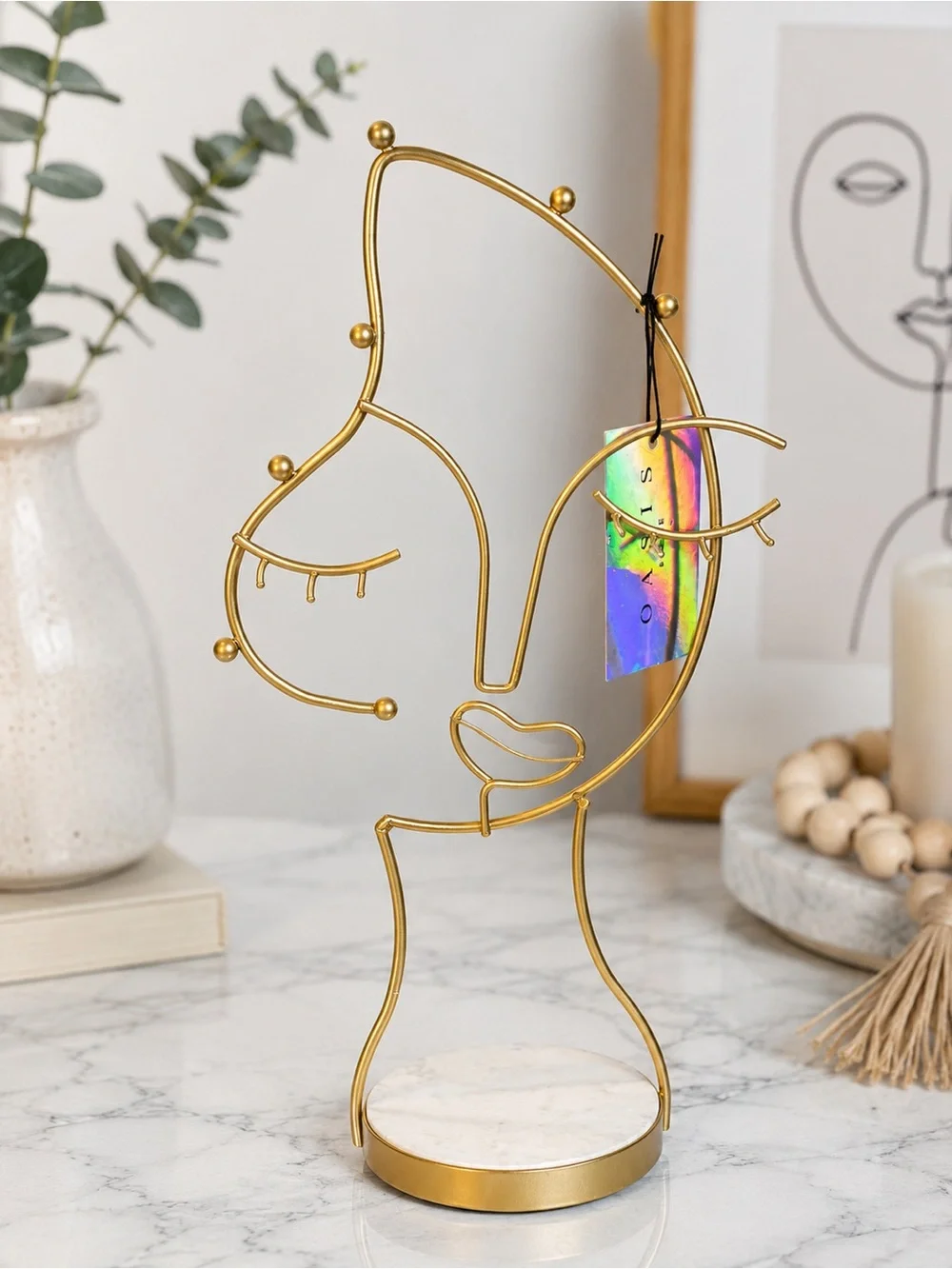 Abstract Gold Wire Jewelry Holder with Marble Base